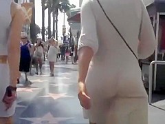 Woman in see through dress black thong