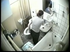 Hidden bath cam shoots nude girl taking the shower