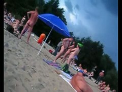 A voracious voyeur loves making videos on the nude beach.