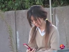 Pig-tailed oriental beauty gets her boobs licked by some stranger