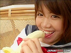 Cute and pretty teen 18+ babe playing with her banana and a hard cock and sticking it up her mouth