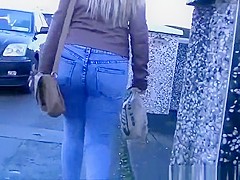 Long hair blonde wearing tight jeans pants