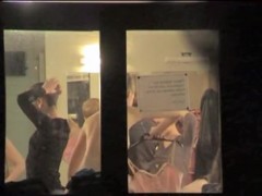 Cute ballet dancers voyeured half nude through the window