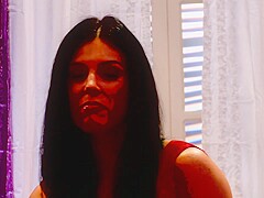 Yummy cougar in a red dress fucks with a horny younger dude