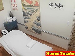 Bigtitted asian masseuse jerking and sucking