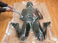Girls experience syncope in vacuum bag (vertical version)