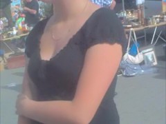 Look down the blouse of the amateur in the street