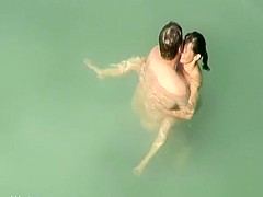 Nudist sex in the water