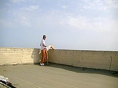 Sex on top of a skyscraper