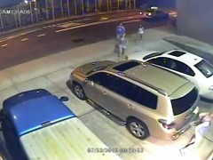 A boozed girl pissing in publick in the underground parking lot