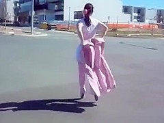 L.ady in Pink Ballet Boots walking outdoors