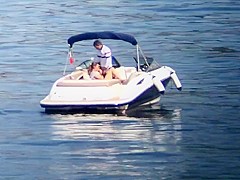 Tasty babe sucks on a cock in the middle of the sea