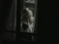 Couple caught fucking through hotel window