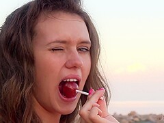 Kinky Lucy Dances Naked In The Beach And Masturbates With A Lollipop! - Andrea Tiffani Shegal