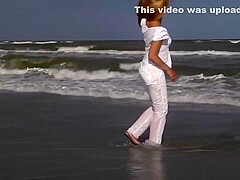 Swimming fully clothed wetlook at the sea