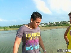 Sexy swimming costume of Sandra turns on her male friend on the seashore