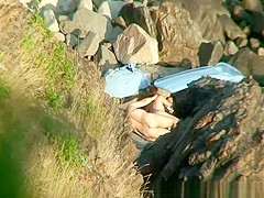 Nudist couple fucking in the rocks