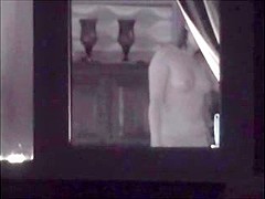 Window voyeur of topless neighbour just in a thong