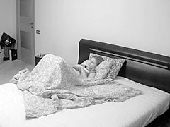 Girl quietly orgasms in bed hidden