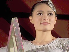 GORGEOUS CHINESE GIRL PERFORMING DEATH DEFYING STUNT