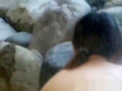 Wet nude Japanese girls in water are watched by hidden guy