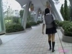 Pig-tailed oriental schoolgirl getting nicely spanked during sharking affair