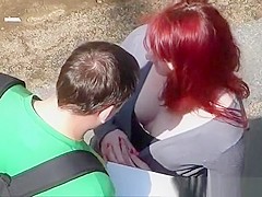Boy's touching girl in cleavage