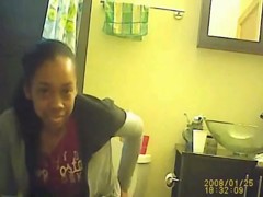 Black girl pissing on toilet has the extra thick pussy hair