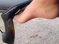 Milf outside high heels dangling