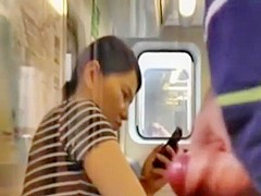 Stroking his small penis on the train