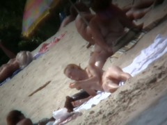 Beach voyeur vid of hippy blonde chick nude sunbathing
