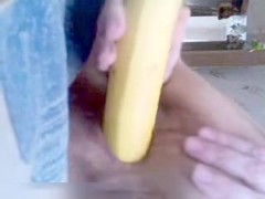 Rubbing my cunt with a sweet banana