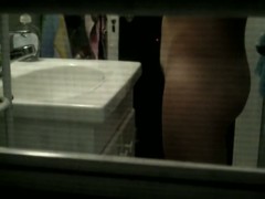 Teen with delicious hips and hairy pussy filmed through the window