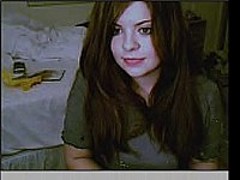 Very sexy teen posing in front of her webcam.