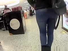 Woman in tight jeans pants and boots