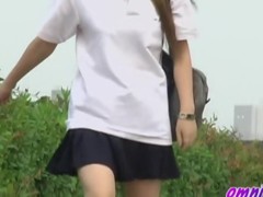 Lovely blonde Asian loses her skirt and panties in public