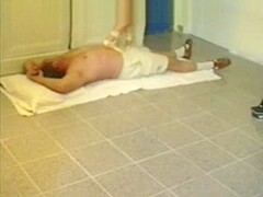 Ballerina trample dance on slave