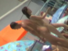Spy beach cams film hot nudist girls playing in the water