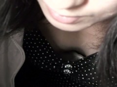 Mature Asian shows her small tits in this cleavage spy shot