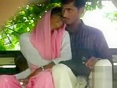 Foxy Desi girl gives her friend a handjob in public