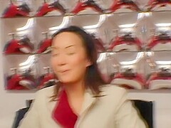 Asian whore takes it in the ass