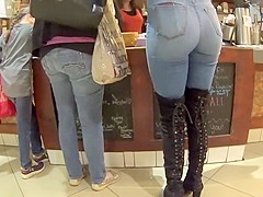 Perfect girl in tight jeans and high boots