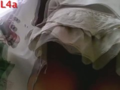 Hot up skirt hidden street cam shot of a girl's ass in thong