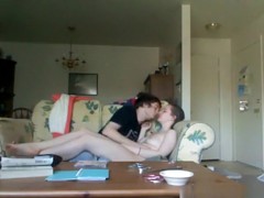 Brunette jerks her bf, gets missionary fucked with belly cumshot on the sofa.
