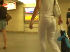 Hot white candid ass covered in tight white denim pants