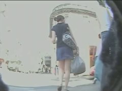 This madame in blue skirt is walking like a sexy model