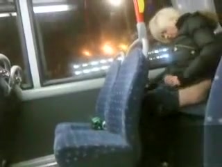 Drunk blonde madam pissing in the back of the bus
