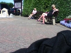 Blonde lady dangling her sandals