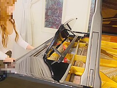 Playing The Piano And Teasing The Slave With Heels In A Rear Seated Position
