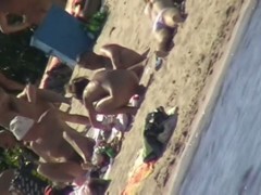 Hot naked red hair chick on nude beach spy camera